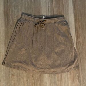 Woman Within Tan Skort